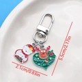 Cute Christmas snowman keychain with green heart pendant and Merry Christmas theme - Christmas Heart Reindeer Snowman U-Shape Keychain (ER840)