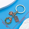 Golden Christmas keychain with enamel wreath, snowflake and Merry X-mas plaque charm - Christmas Wreath Snowflake Tree Keychain (ER814)