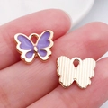Pendentif papillon en émail violet pour bijoux DIY avec revers doré texturé - Violet 12x11mm (12490)