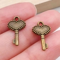 Colgante llave de corazón bronce vintage de aleación para creación de joyas DIY y artes - Llave Corazón Bronce Antiguo (20981)