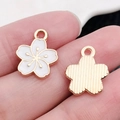 White cherry blossom charm with gold trim for DIY jewelry and earring making - Small Cherry Blossom 12x14.5mm (19184)