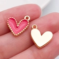 DIY jewelry charm featuring pink enamel heart with gold wavy edge and a plain gold heart - Heart Style / Rose Red