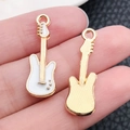 White enamel guitar pendant charm in gold alloy for DIY jewelry earrings and bracelets - Musical Guitar Instrument 27x9mm (19457)