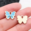 Pendentif papillon bleu en alliage doré pour la fabrication de bijoux DIY - Bleu Lac 13x10.5mm (11960)