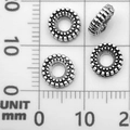 Retro antique silver spacer beads with granulated texture on a millimeter measurement mat - Spacer Bead (21071)