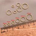 Confronto dettagliato di anellini a spirale placcati oro 18K da 4mm a 12mm su un righello - 0.8x4mm / Oro 18K
