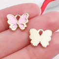 Pink enamel butterfly charm with golden alloy back and textured finish for DIY jewelry - Pink 13x10.5mm (11864)