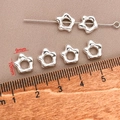 Macro view of 9x10mm silver star spacer beads with ruler for DIY jewelry making - Thick Silver Long Lasting
