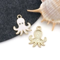 Pendentif poulpe doré avec émail blanc et dos texturé pour la création de bijoux DIY - Poulpe Océan Émail Blanc Or KC (16750)