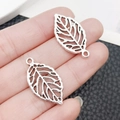 Silver vintage hollow leaf charms for DIY bracelets with detailed metallic textures - Antique Silver Hollow Leaf Style (6522)