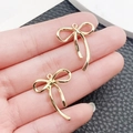Ciondoli a fiocco in oro KC lucido in lega di zinco per gioielli fai da te - Fiocco Semplice (25x21mm)