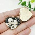 Enamel heart pendant featuring a kissing skeleton design with gold moon and stars - Heart Skull Couple (18911) Pendant Only (Without Chain)