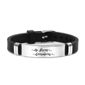 Detail of black silicone bracelet with engraved Be Strong AND Courageous metal plate - Be Strong AND Courageous