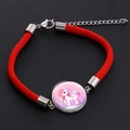 Red braided unicorn bracelet featuring a glass gem centerpiece and steel clasp - Style 10 (BOB319)