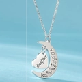 Detail of silver moon and heart necklace with engraved I love you to the moon and back text - Daughter (Style 4)
