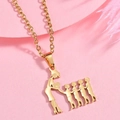 Macro detail of gold family necklace featuring a mother and four children silhouette pendant - Gold Four Sons Silhouette