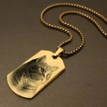 Macro detail of custom gold rectangle pendant featuring a laser engraved cat portrait - 2.5x4cm / Gold