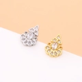 Detailed macro view of teardrop bow earrings with zircon pave setting in gold and silver - Silver Teardrop Style (6#)