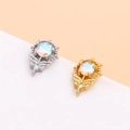 Detail of geometric bow crown earrings with iridescent stones and wing-shaped metal design - Silver Scepter Style (7#)