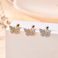 Macro detail of butterfly cartilage studs in gold and silver with cubic zirconia stones - Paved Butterfly (5#)