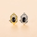 Dettaglio di orecchini vintage oro e argento con pietra nera ovale e piccoli zirconi - Stile Ovale Bohémien (7#) / Argento