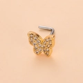 Détail d'un piercing nez papillon doré serti de cristaux brillants sur fond beige doux - 7# Or