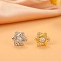 Detailed close-up of stacked star stud earrings with pavé crystals on champagne silk fabric - 11# (Hexagonal Star)