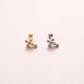 Close-up of cross stud earrings with tiny gems in gold and silver finishes on pink texture - Cross Style (5#)