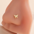 Detail shot of a butterfly nose stud with gold plating and micro-inlaid white zircons - Butterfly Shape Style (8#) / Gold