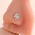 Silver stainless steel nose stud with sunburst design and green stone on model - Sunburst Style (9#) / Silver