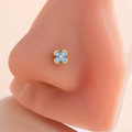 Sky blue zircon flower nose stud with gold finish on a professional display model - Sky Blue Four-Petal Flower Style (5#) / Gold
