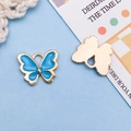 Blue enamel butterfly charms with golden alloy base for DIY jewelry making - Lake Blue