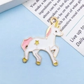White unicorn alloy charm with pink mane and golden trim for DIY jewelry making - Enamel Unicorn (11447)