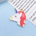 Golden unicorn alloy pendant with white enamel and vibrant red mane for DIY jewelry - Pink Enamel Unicorn Head (11454)