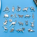 Set of vintage silver animal pendants including elephant and cat for DIY jewelry making - Antique Silver Animal Collection (SN688)