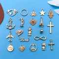 Set of 20 golden alloy travel charms including heart, Eiffel Tower, and anchor motifs - Mixed Charms Set