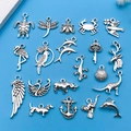 Mixed silver alloy animal charms including dolphin, flamingo, and owl for DIY jewelry making - Antique Silver Assorted Animal Styles (SN693)