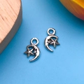 Pendentifs lune et étoile en argent antique pour création de bijoux DIY sur fond bleu - 16x21mm / Lune à Visage Étoile Argent Antique