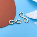Infinity symbol alloy pendant in rose gold finish for DIY jewelry making accessories - Infinity Symbol Style