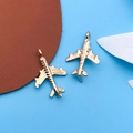KC gold alloy airplane charms for DIY bracelets and earrings with a polished finish - Transport Airplane Style