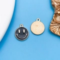 Colgantes de cara sonriente dorados con esmalte negro para creación de joyas DIY - Cara Sonriente Esmaltada (11924)