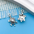 Silver alloy sea turtle charms set with detailed shell texture and rounded hanging loops - Antique Silver Ocean Turtle (4256) / 12x23mm