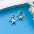 Pair of glossy silver alloy star charms with 3D faceted design for DIY jewelry making - Antique Silver Small Star 8x11mm (5082)