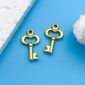 Pair of vintage style golden alloy key charms with hollow heart design on blue background - Antique Gold Heart Key (11376)