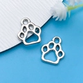 Silver alloy paw print pendant charms for DIY jewelry making and necklace crafts - Antique Silver Hollow Paw Style