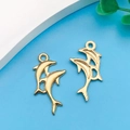 Golden sea dolphin charms for DIY bracelets with a polished front and textured hollow back - Dolphin Style