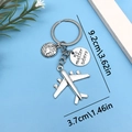 Travel keychain with airplane globe and engraved circular charm in bright silver finish - Plane Globe No Matter Where Tag (ER679)