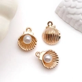 Detailed close-up of seashell pendants with faux pearls and golden coating for DIY jewelry - KC Gold Enamel Pearl Shell (11948) / 12x15mm