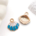 Detailed close-up of blue and white enamel seashell pendants with golden metal texture - Lake Blue Enamel Marine Shell (14348) / 16x17mm
