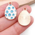 Cartoon enamel Easter egg charms with blue polka dots and golden textured back - Blue White Dot Egg (15143)